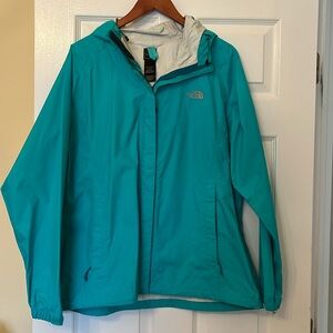 Turquoise North Face rain coat